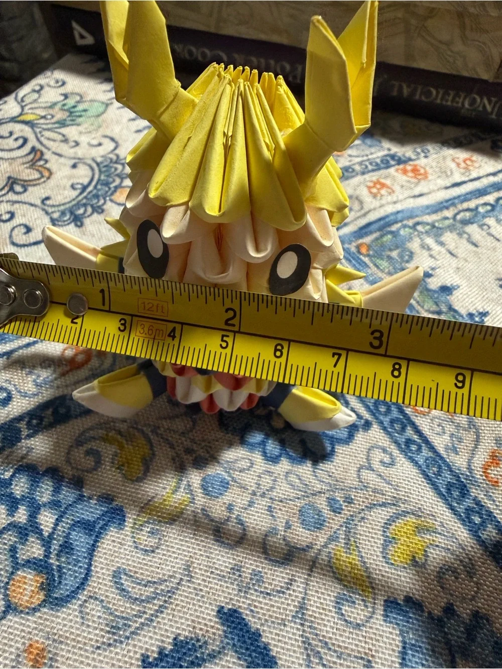 Preloved: 3D origami figure crafted using modular paper folding techniques.